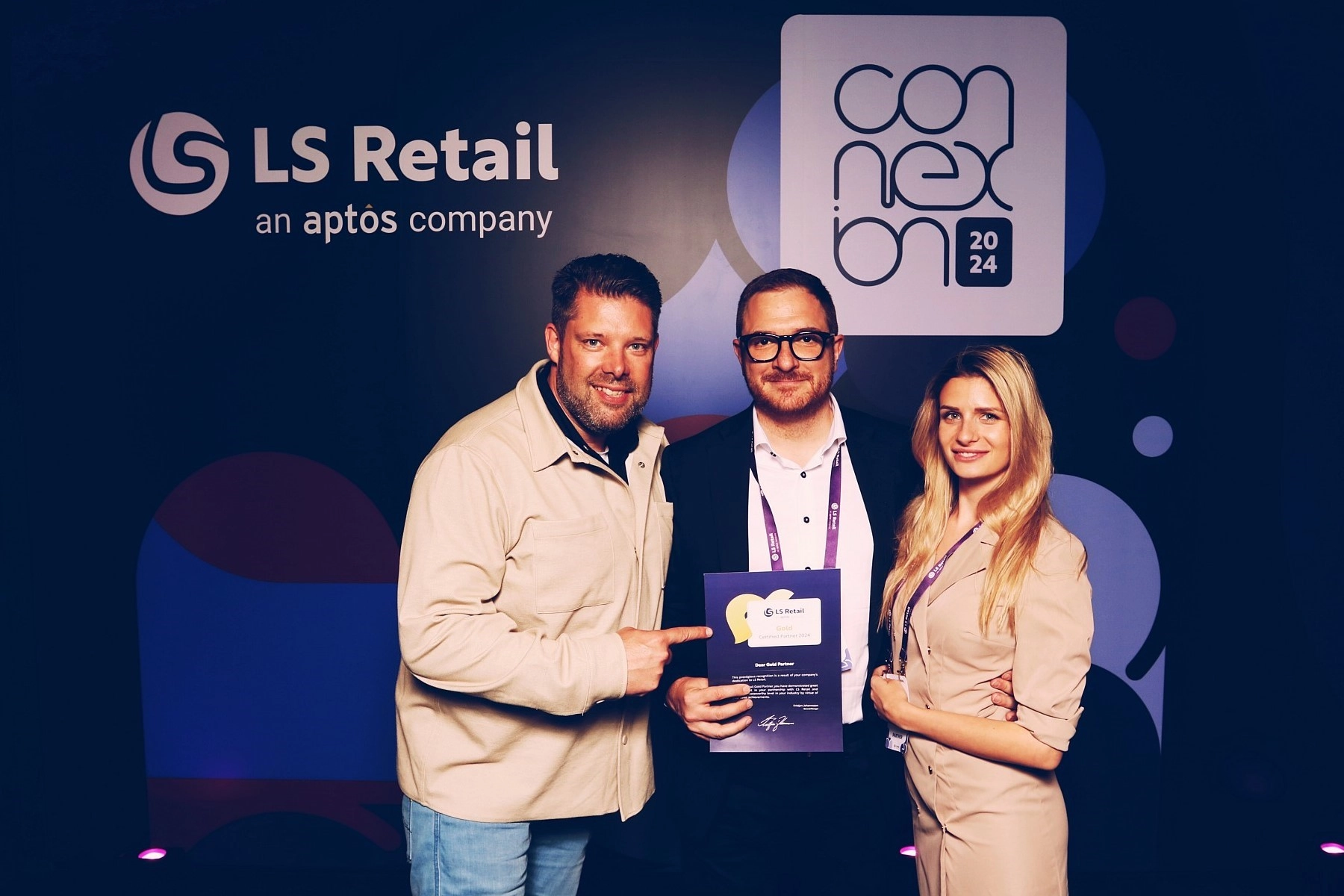 Barry Katteestaart, Dimitar Iliev and Donka Dimitrova, NavTech Group, with the Gold Partner Award by LS Retail